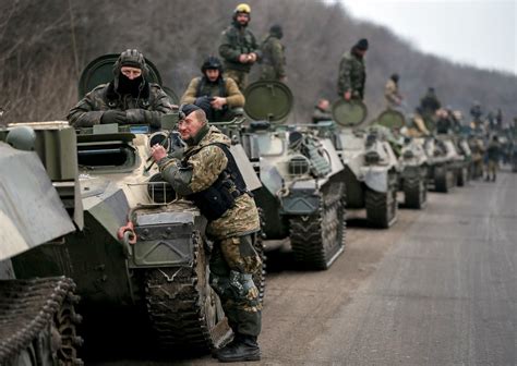 ukraine to pull back artillery from edge of separatist zone the new york times