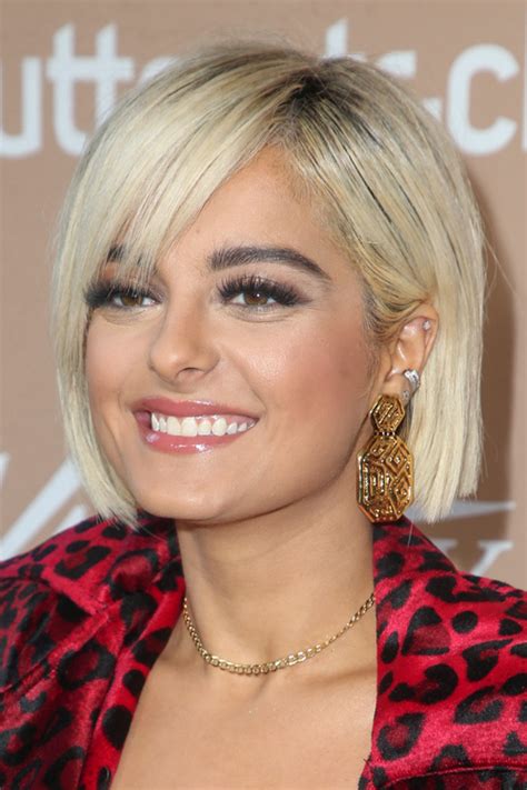Bebe Rexha Straight Platinum Blonde Dark Roots Sideswept Bangs Hairstyle Steal Her Style