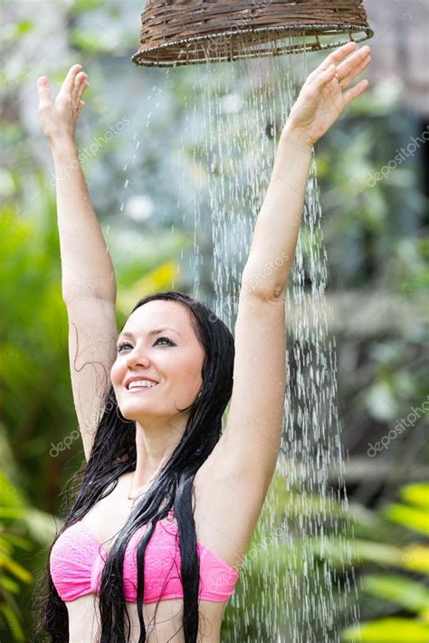 Sexy Woman With Long Hair In Bikini Under The Shower On Tropical Beach