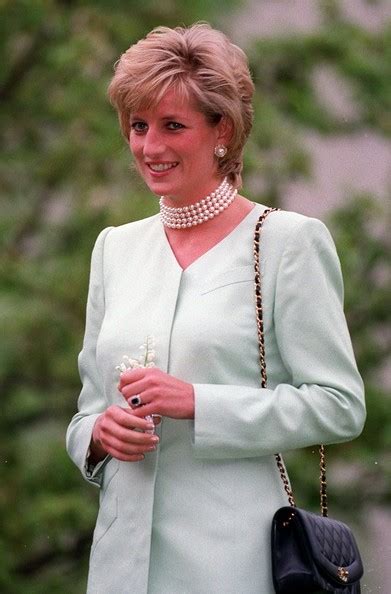 A matching diamond and sapphire watch, bracelet, pendant, ring. Global Art: pictures of princess diana wedding ring
