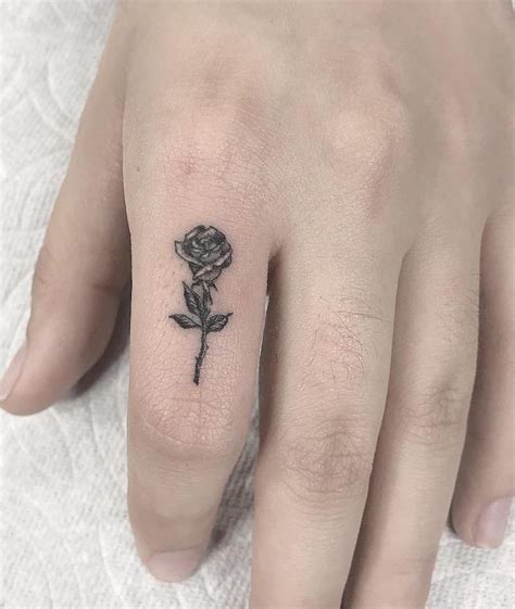 Rose Small Tattoo by Romeo Lacoste Small Tattoo Cost, Small Tattoo