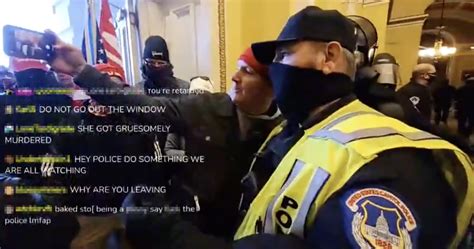 Video Appears To Show Capitol Hill Police Officer Taking Selfie With Rioter
