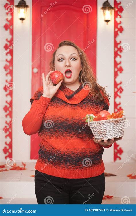 Beautiful Caucasian Emotional Chubby Woman With Apples In Small Basket