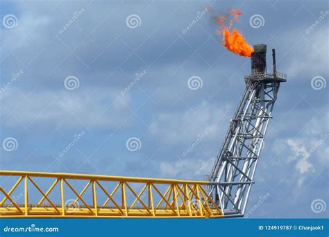 Gas Flare Is Releasing And Burning To The Atmosphere At An Offshore Gas