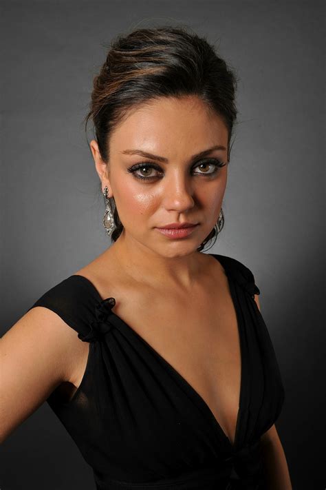 Brunette Stunner Mila Kunis Displaying Her Cleavage in a ...