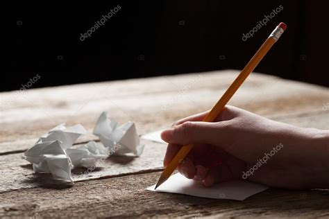 Woman Writing On Sheet Of Paper — Stock Photo © 4masik 72324879