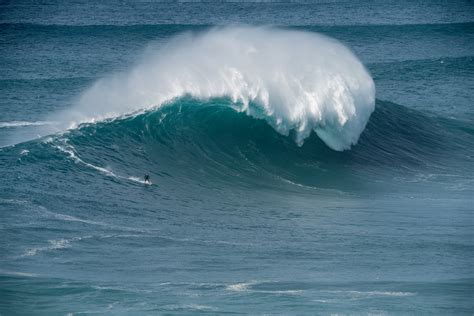 Riding The Giant Big Wave Surfing In Nazaré