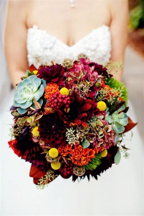 More and more florists are being asked to create floral arrangements with products such as heirloom carrots, purple kale and citrus. 30 Fall Wedding Bouquets - Rustic Wedding Chic