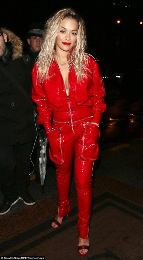Rita Ora Flashes Cleavage In Red Jumpsuit At Pfw Party Daily Mail Online