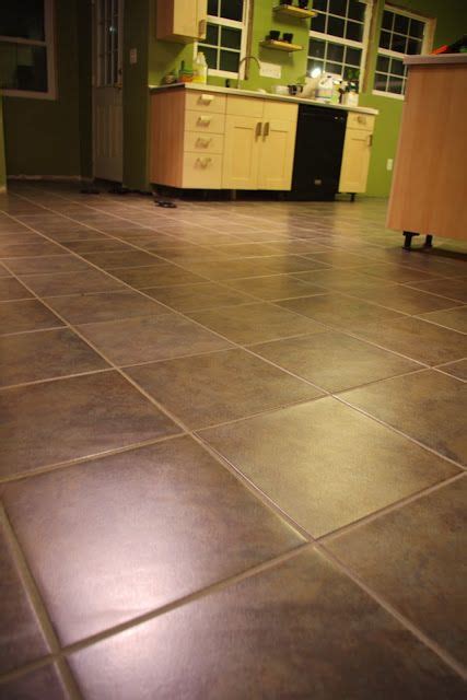 Vinyl kitchen flooring is an excellent choice as it offers a hard wearing, hygienic easy to clean option for this most important space. DIY: Luxury Vinyl Tile, peel and stick AND groutable ...