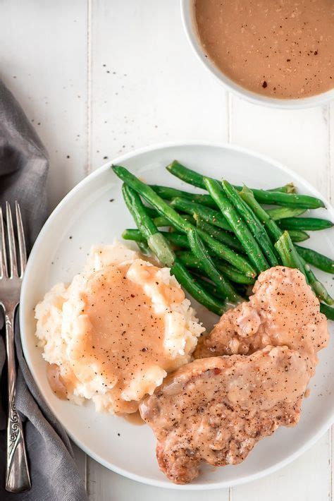Does your family prepare pork chops or chicken more too often? Slow Cooker Pork Chops and Gravy | Recipe | Slow cooker pork chops, Slow cooker pork, Pork chops ...