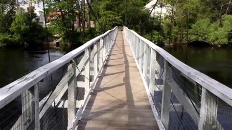 Walking The Foot Bridge Over The Kennebec River In Skowhegan Maine