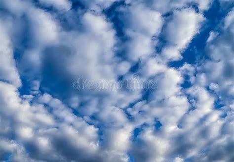 Beautiful White Cloud Formations On A Blue Summer Sky Stock Image