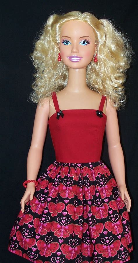 My Size Barbie Is Pictured Here Wearing A Very Cute Spaghetti Strap Little Red Dress The Bodice