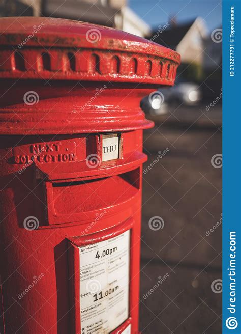 Red British Pillar Box Free Standing Post Box In Wales Editorial Photo
