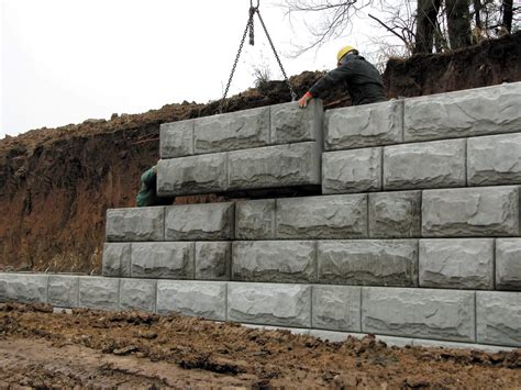 Interlocking blocks made from cast concrete are specifically engineered for building block retaining walls. How to Build A Cinder Block Retaining Wall With Rebar ...