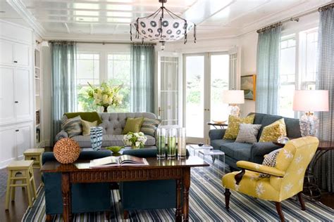 This living room boasts a beautiful set of seats, carpet flooring and yellow walls. Brown And Mustard Yellow Living Room - Interior Decorating ...