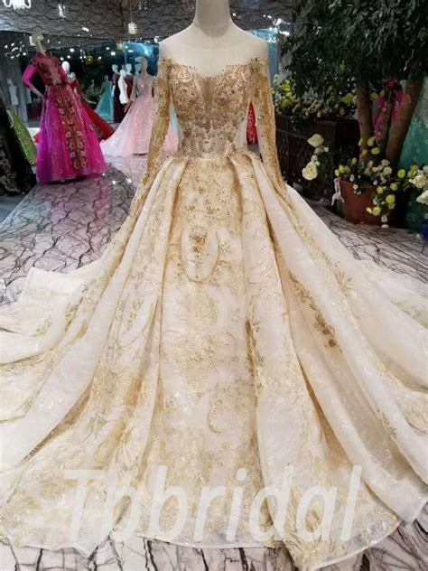 Just before completing your order, take a moment to check for coupons and you'll save even more on off shoulder sleeves wedding dress. Gold Wedding Dress With Sleeve Haute Couture Bridal Dress