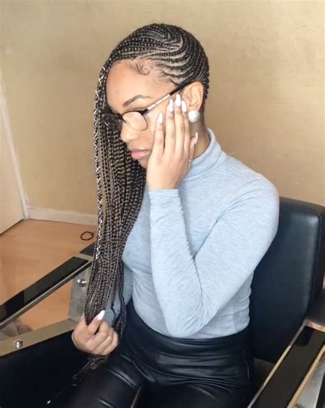 The ponytail can be made in several ways and modern tricks and tips can be employed to give it a departure from the typical ponytail. Lemonade Braids | Most Popular Black Braided Hairstyle ...
