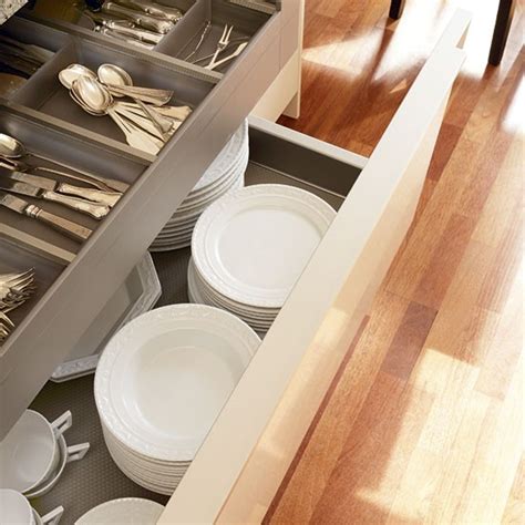 This drawer within a drawer combination uses a click to open side mount rail for the inner drawer. Pull-out kitchen drawer | Kitchen tour | Galley kitchen with hi-gloss units | housetohome.co.uk