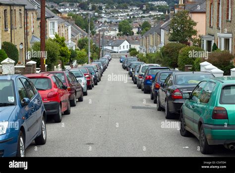 Narrow Street With Cars Parked On Both Sides Of The Road Harrison