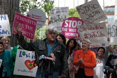 PHOTOS: Feminists Rally Across from the Beverly Hills Hotel to # 