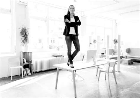 Woman Standing On Desk Kylian