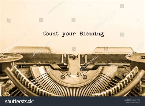 An Old Fashioned Typewriter With The Words Count Your Blasing