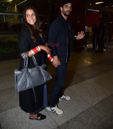 Newly Married Couple Neha Dhupia And Angad Bedi Spotted At Airport Photos Filmibeat