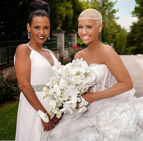 oh my goodness amber rose and wiz khalifa post their wedding photos on instagram for their 1 year