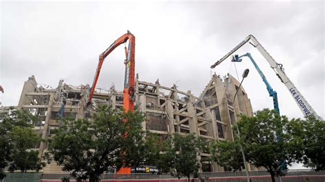 Watch End Of An Era Camp Nou Demolition Gathers Pace As Cranes Tear Down Barcelonas Famed