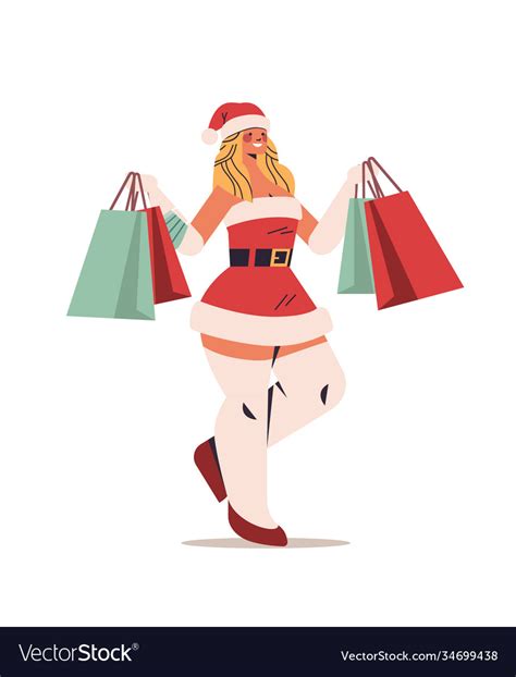 beautiful woman in santa claus costume holding vector image