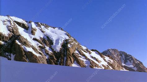 Wide Shot Snow Covered Mountains Stock Video Clip K0089659