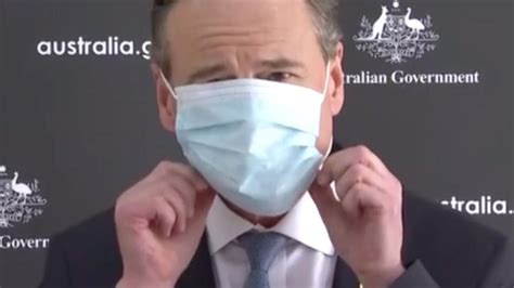 Coronavirus Australia Greg Hunt Struggles With Virus Face Mask Video