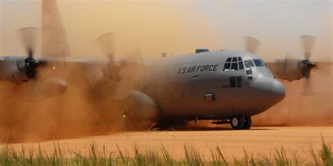 Filec 130 Hercules Performs A Tactical Landing On A Dirt Strip