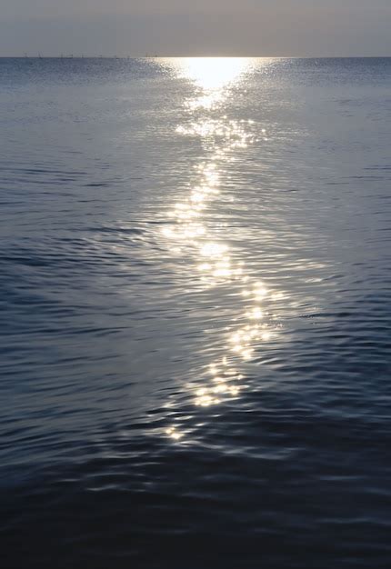 Premium Photo Moonlight Path On Night Sea Water Surface