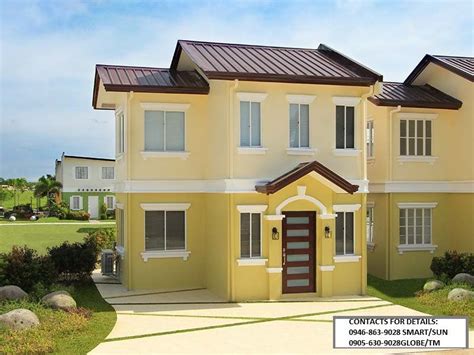 Sloping lot house plans (18). Single Attached FLOOR AREA: 52 square meters (560 sq. ft ...