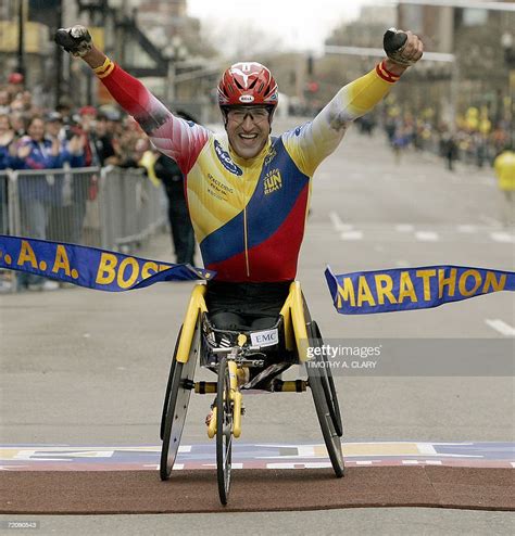Ernst Van Dyk Of South Africa Crosses The Finish Line To Win The