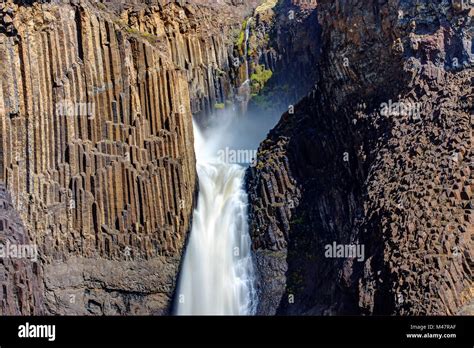 The Litlanesfoss Waterfall In Iceland With Its Basaltic Columns Stock
