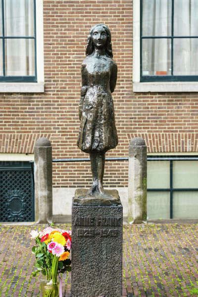 Statue Of Anne Frank Outside Westerkerk Church Amsterdam North