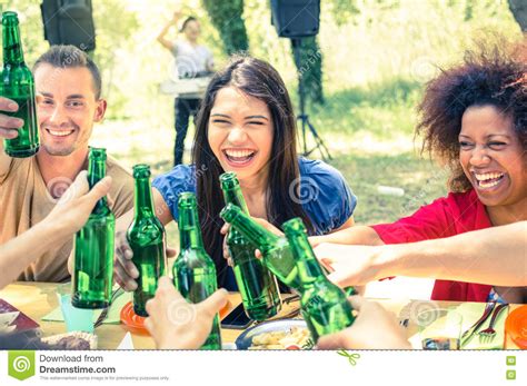 Multiracial Friends Having Fun At Barbecue Garden Party Stock Image