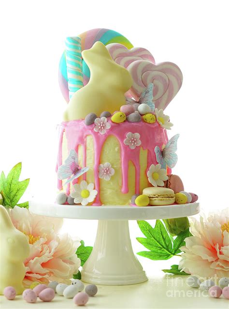 Easter Candy Land Drip Cake Decorated With Lollipops And White Bunny