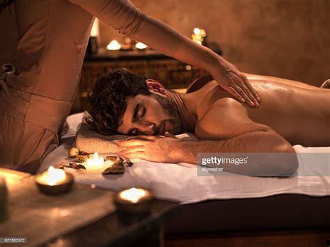 Young Man Enjoying With Eyes Closed During Back Massage High-Res Stock ...
