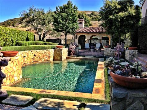 Tuscan villas... imagining myself sitting on the side of that pool with
