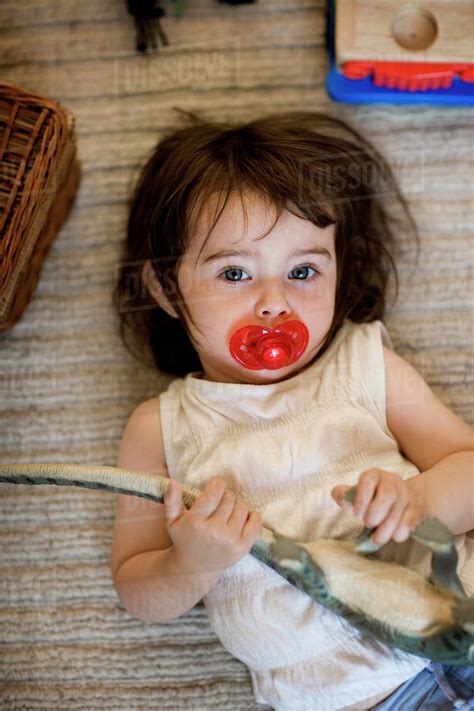 Girl With Pacifier Stock Photo Dissolve