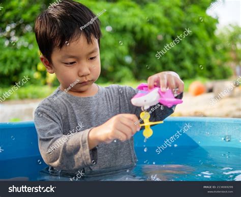 Asian Cute Child Boy Playing Water Stock Photo 2134069299 Shutterstock