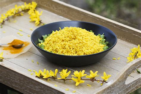 Cover the saucepan, reduce heat to low, and simmer until water is absorbed and rice is cooked, about 20 minutes. How to make perfect yellow rice with turmeric and brown ...