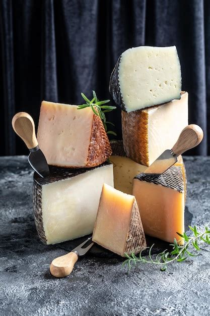 Premium Photo Cheese Board Of Various Types Of Soft And Hard Cheese