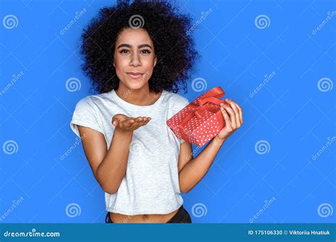 Celebration Mulatto Girl Standing Isolated On Blue With T Sending