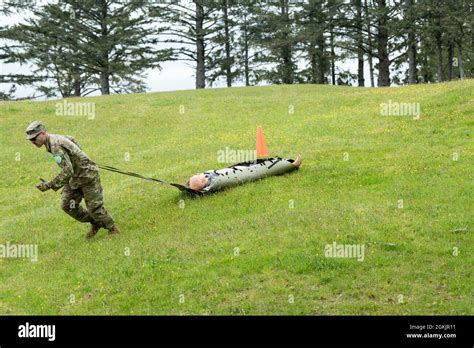 Alaska Army National Guard Sgt Hector Colon Pulls A Simulated Casualty